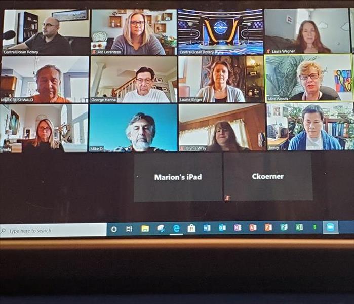 Members of the Rotary Club on a Zoom meeting