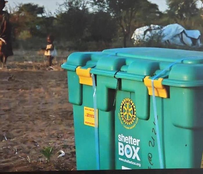 Image shows the Shelter Box from Rotary International via Zoom 